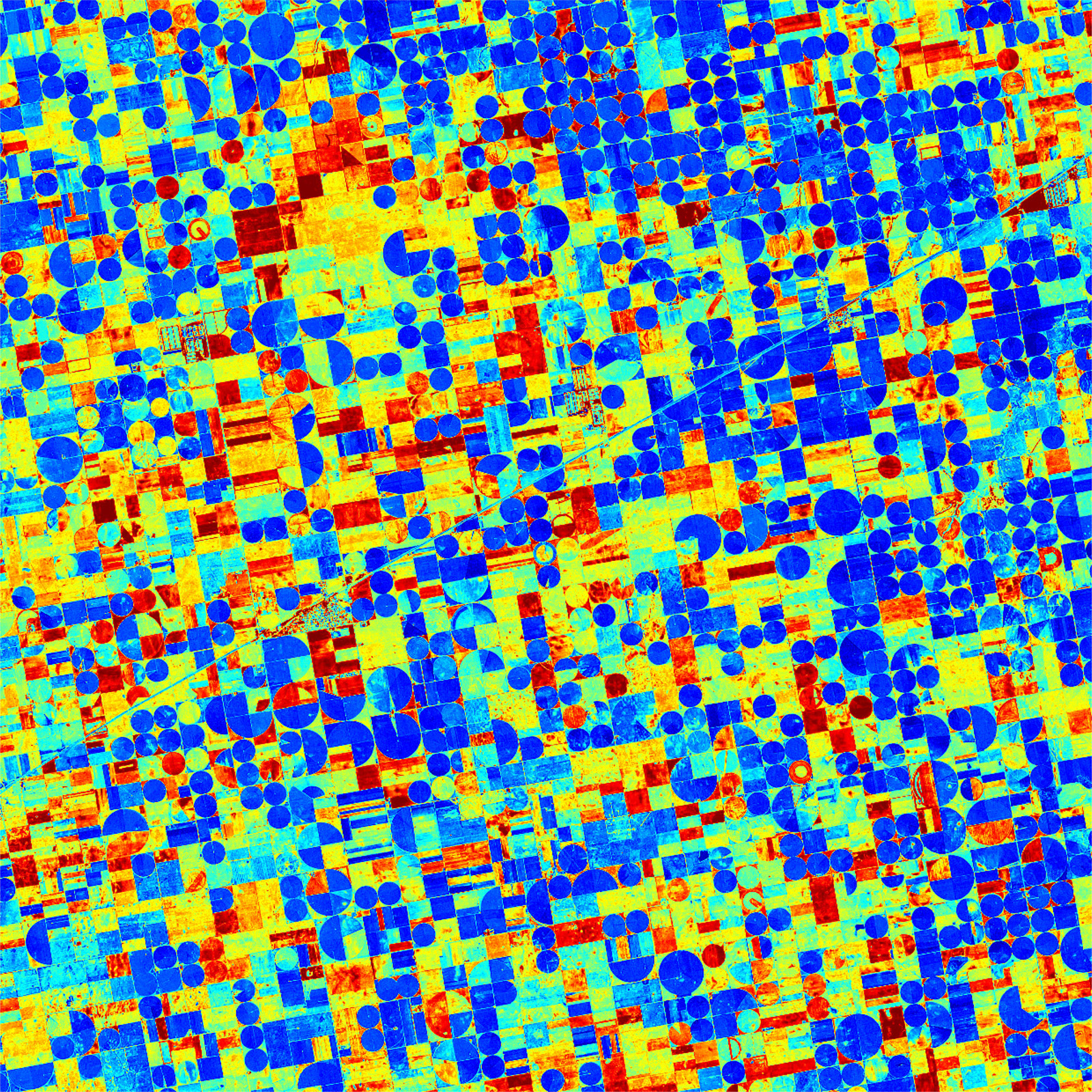 Landwirtschaftliche Flächen, vom Satelliten aus mit der Wärmebildkamera betrachtet. In der beispielhaften Auswertung steht Rot für hohe Temperaturen und drohende Wasserknappheit.